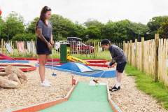 Mother-and-child-playng-mini-golf-Atlantic-Reach