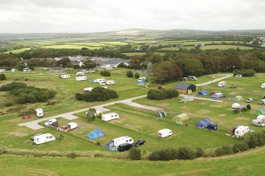 Aerial view of the touring fields and seasonal pitches at Atlantic Reach, Cornwall