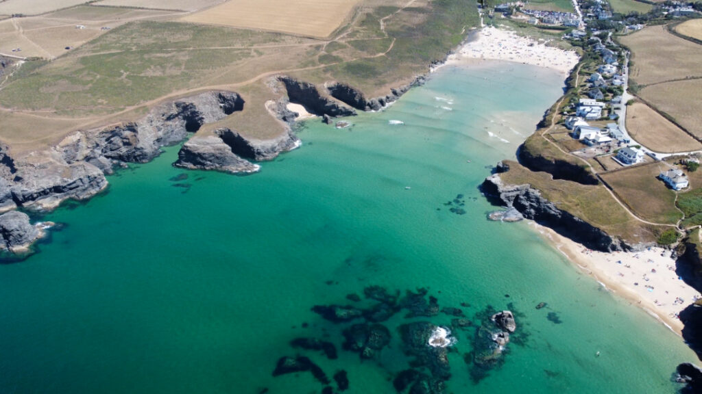Turquoise sea and sandy cove on the Cornish coast