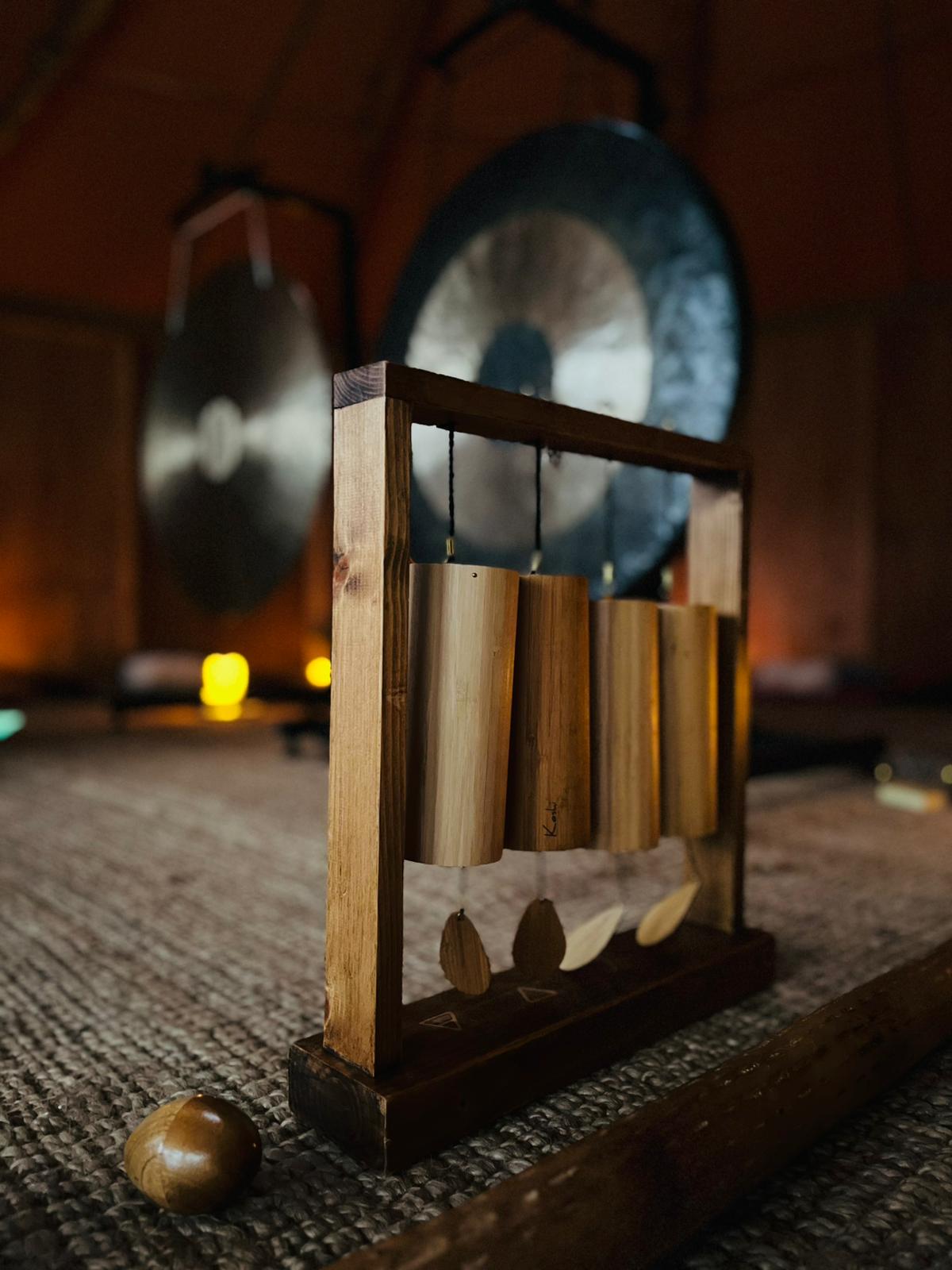 Gong sound bath at Atlantic Reach in Cornwall: bamboo chimes and gongs ready for the session