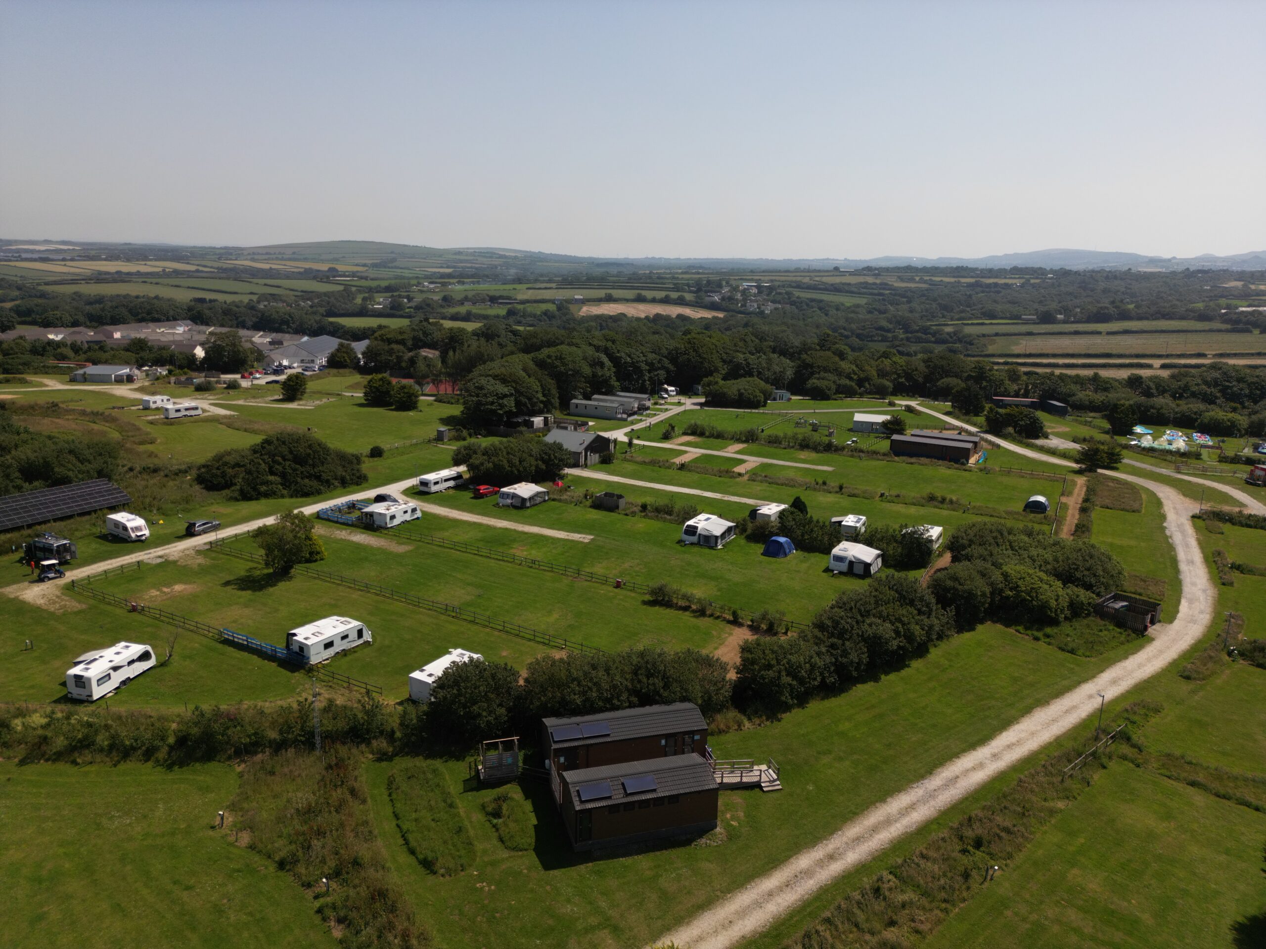 Aerial view of Atlantic Reach at Whitecross near Newquay, Cornwall, for a Halloween half-term break